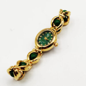 Montre lux doré et vert en acier inoxydable