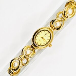 Montre à perle fond doré